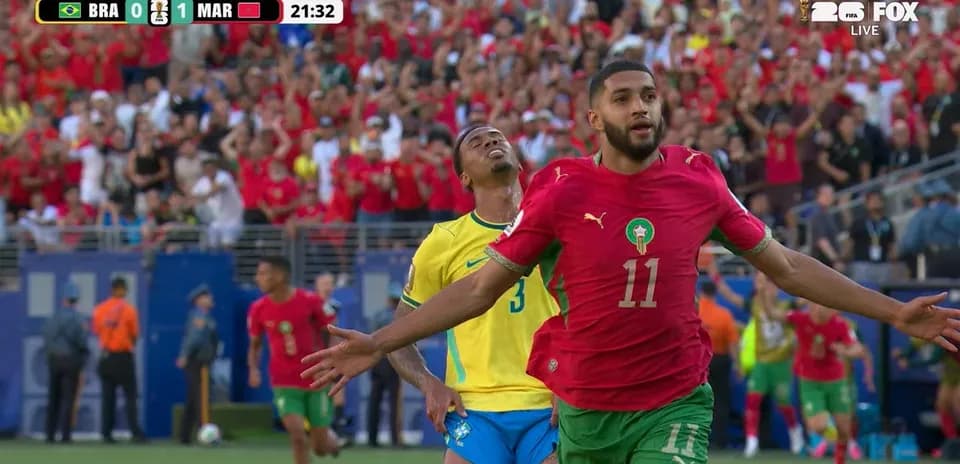 Joueur marocain célèbre un but contre le Brésil