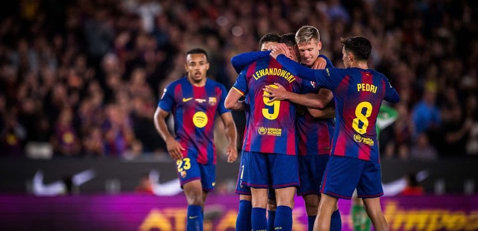 Joueurs du FC Barcelone célébrant un but