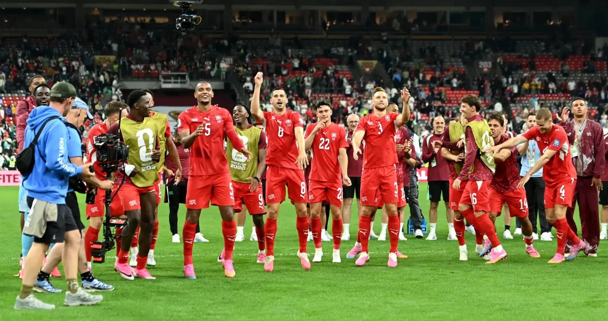 Joueurs de la Suisse célébrant sur le terrain
