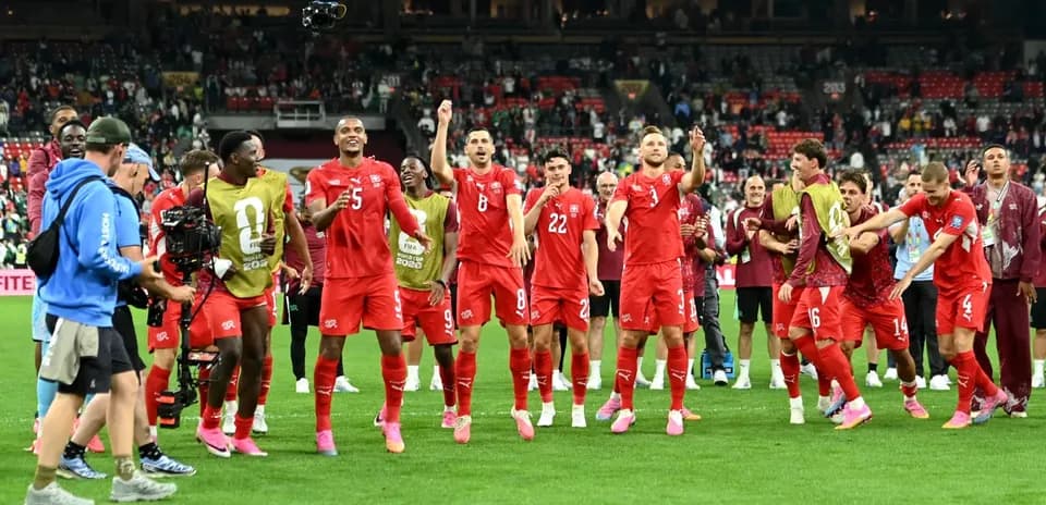 Joueurs de la Suisse célébrant sur le terrain