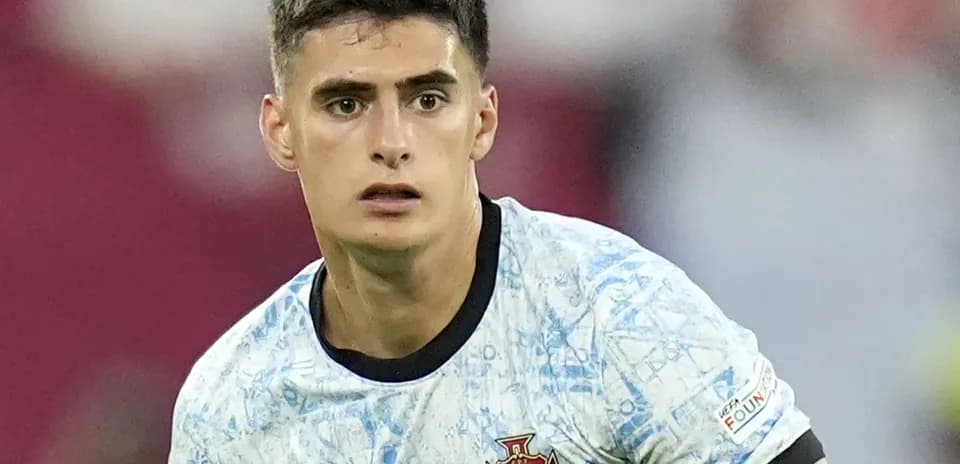 Joueur de l'équipe du Portugal en action sur le terrain