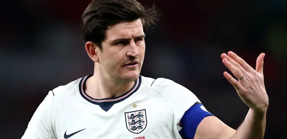 Joueur anglais gesticulant sur le terrain