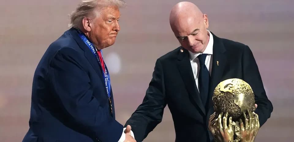 Donald Trump shake hands with FIFA president Infantino