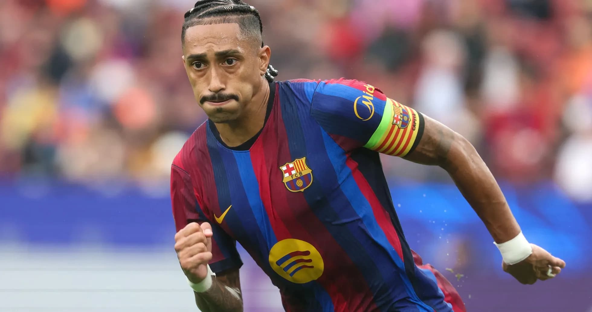 Joueur du FC Barcelone courant sur le terrain