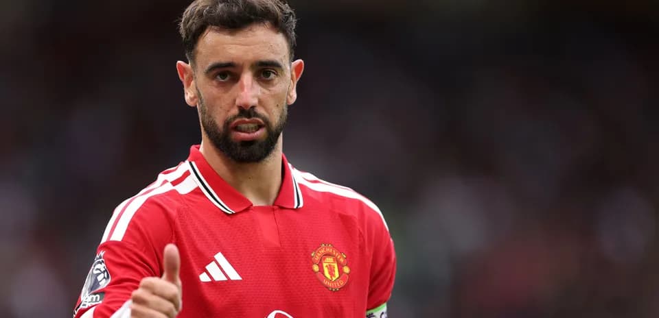 Joueur de Manchester United faisant un geste positif