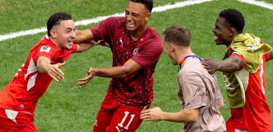 Joueurs suisses célébrant un but
