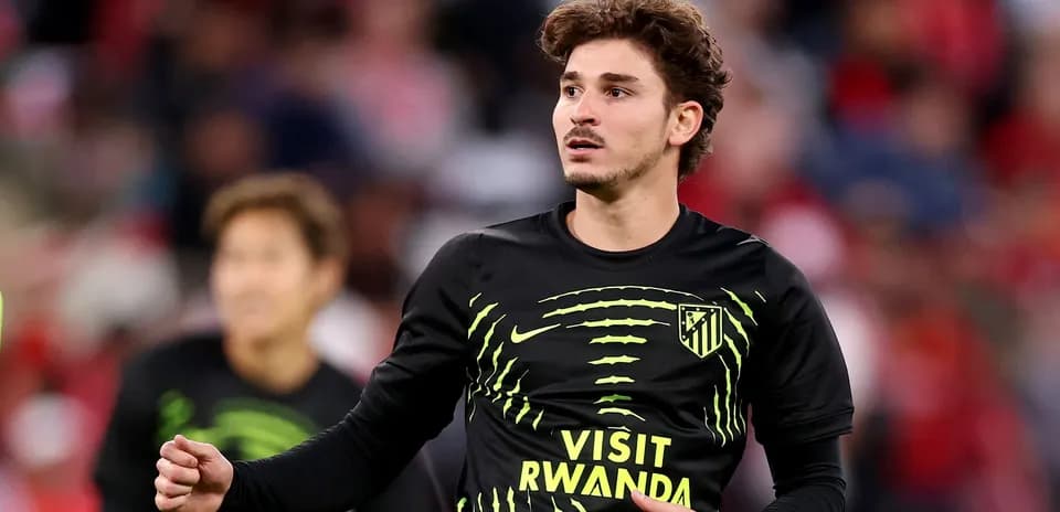 Joueur d'Atlético de Madrid en échauffement avant le match