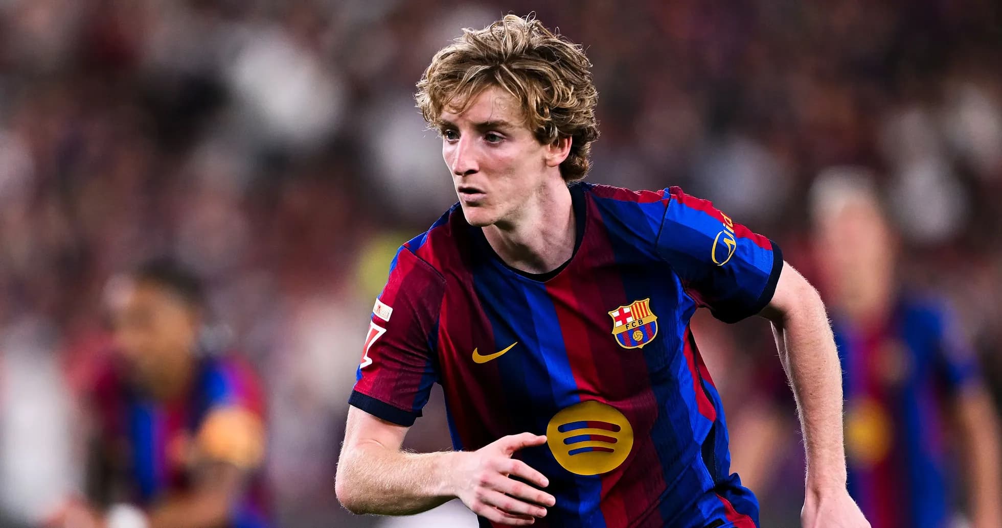 Joueur du FC Barcelone courant sur le terrain