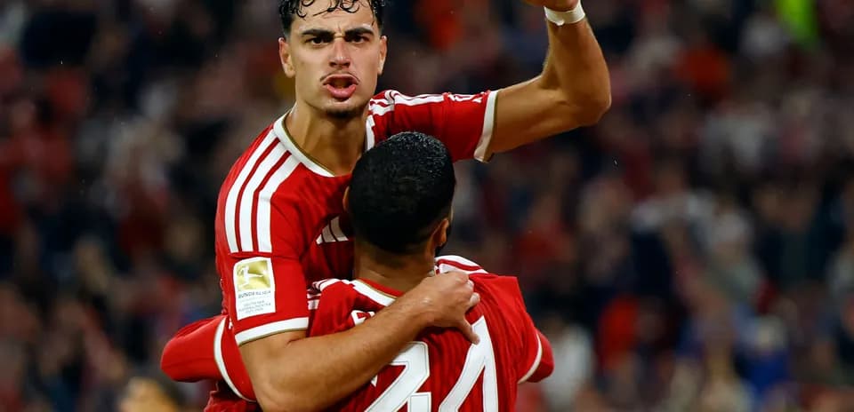 Joueurs célébrant un but lors d'un match