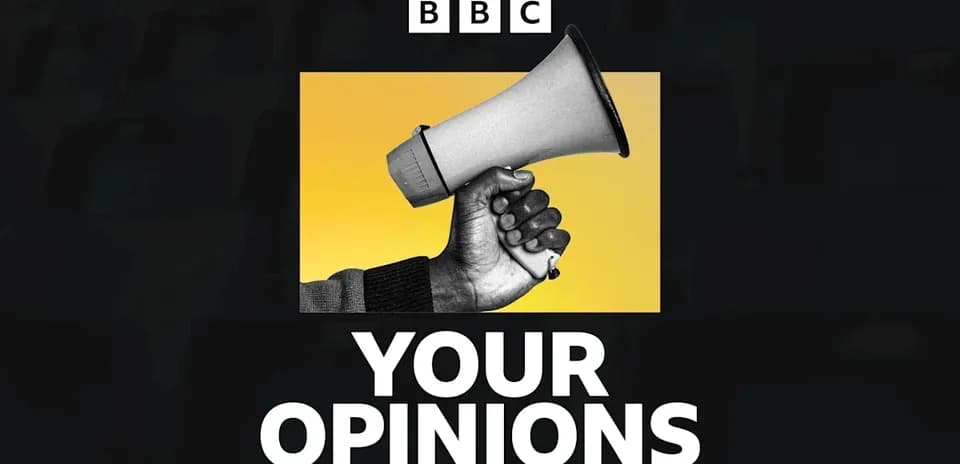 Mainly a hand holding a megaphone on yellow background