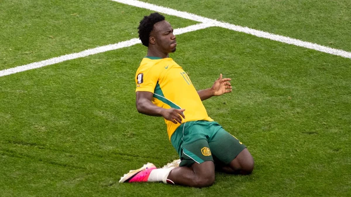 Joueur s'agenouillant sur le terrain après un but