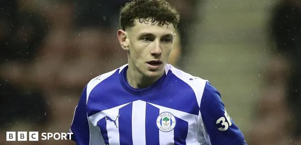 Joueur de Wigan Athletic en action sur le terrain