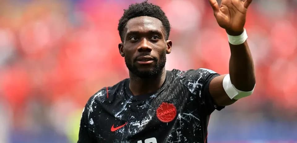 Joueur du Canada saluant les supporters
