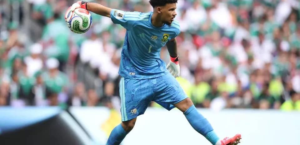 Gardien de but en action lors d'un match