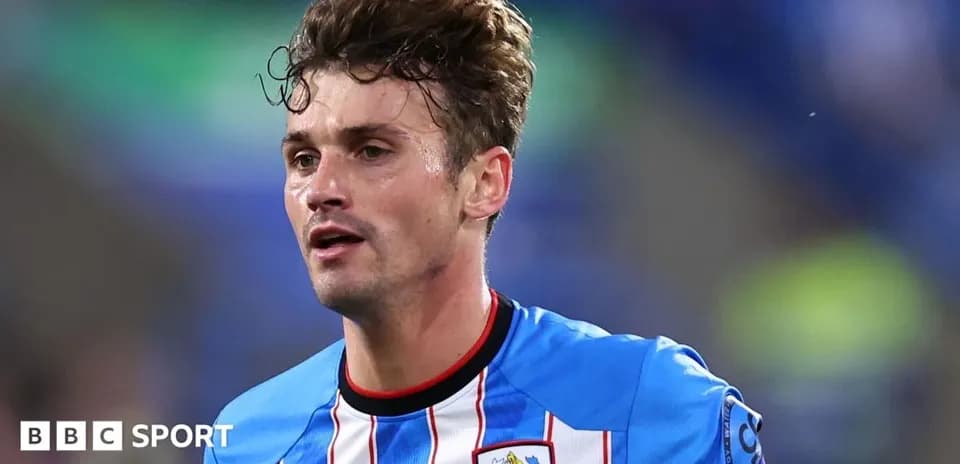 Joueur de Huddersfield Town en tenue de match