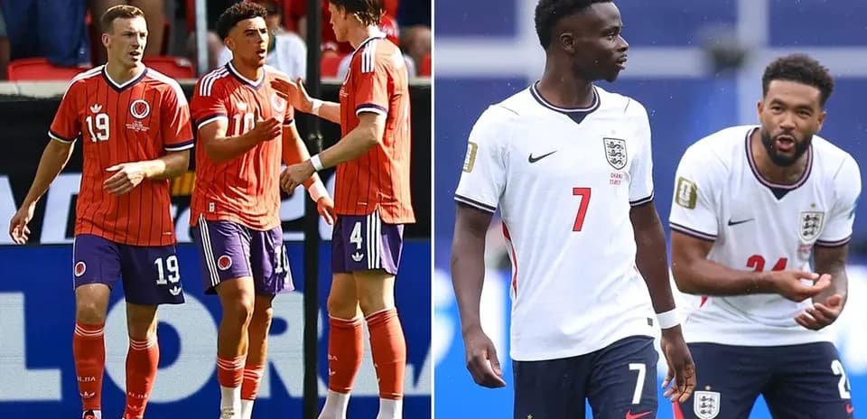 Joueurs de Colombie et d'Angleterre discutant sur le terrain