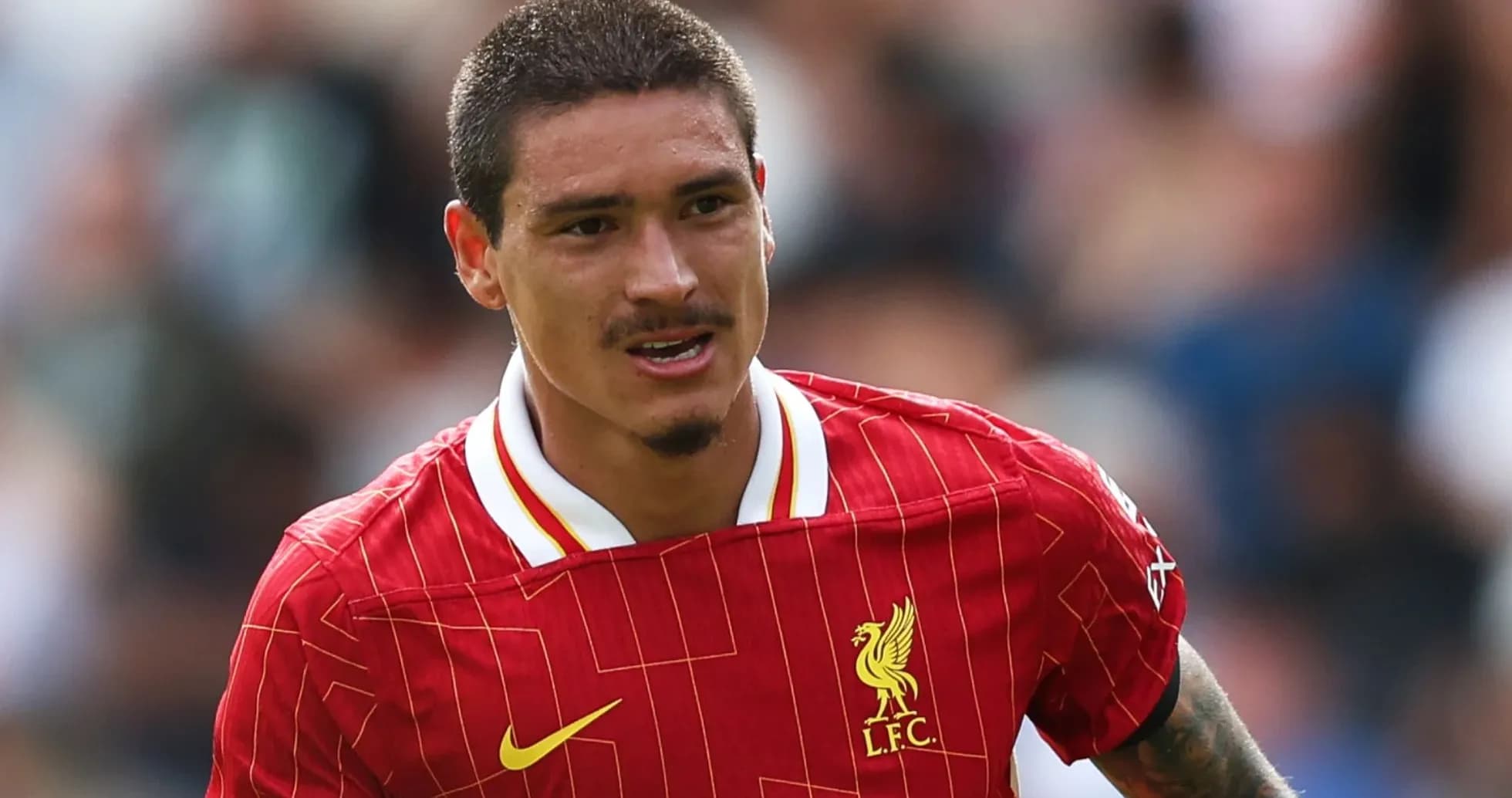 Joueur de Liverpool en action sur le terrain