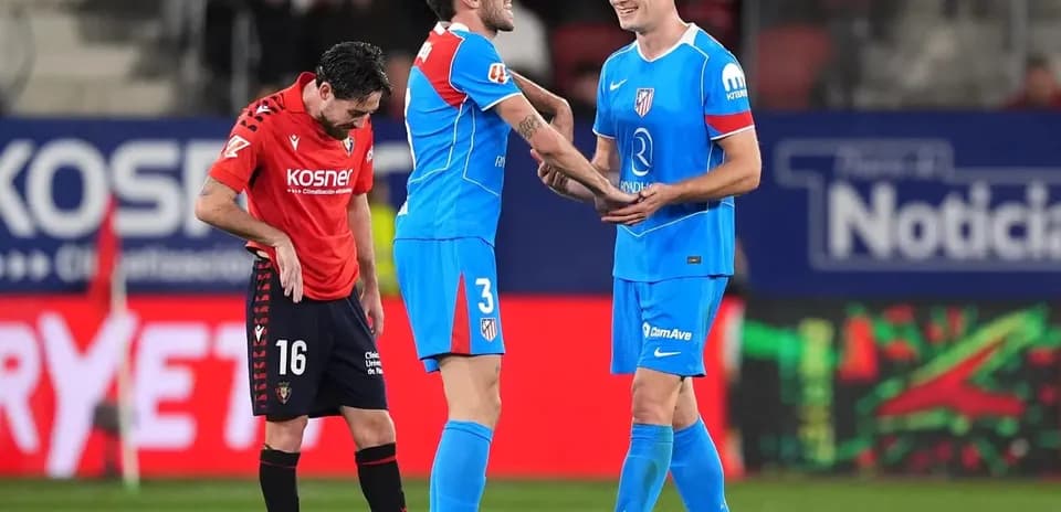 Joueurs d'Atletico Madrid et Osasuna sur le terrain