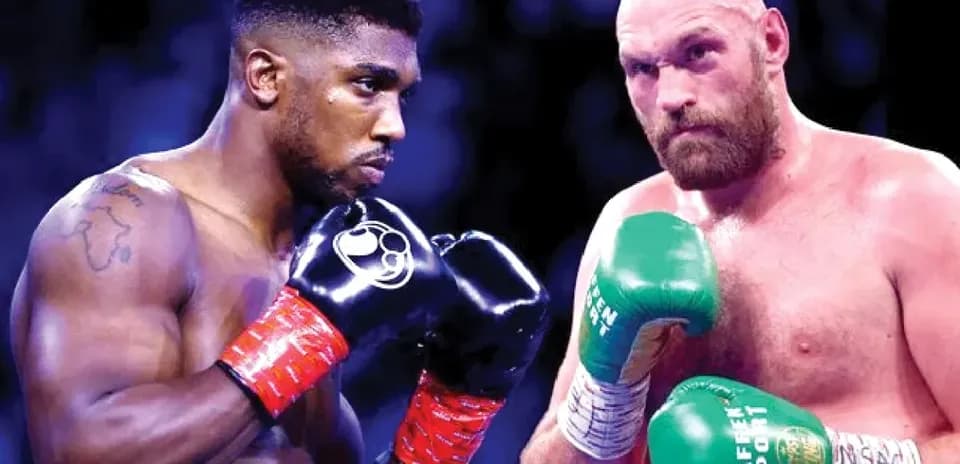 Anthony Joshua and Tyson Fury in boxing stance