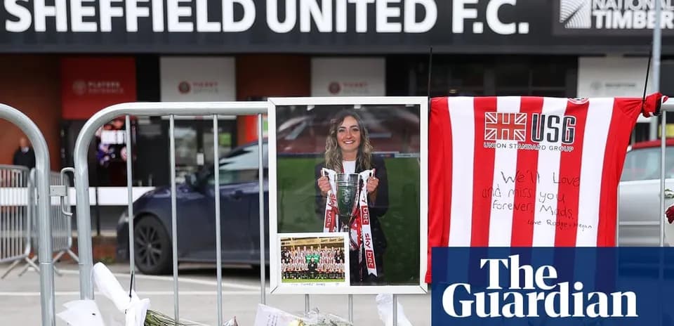 Tribute with flowers and photo outside Sheffield United F.C.