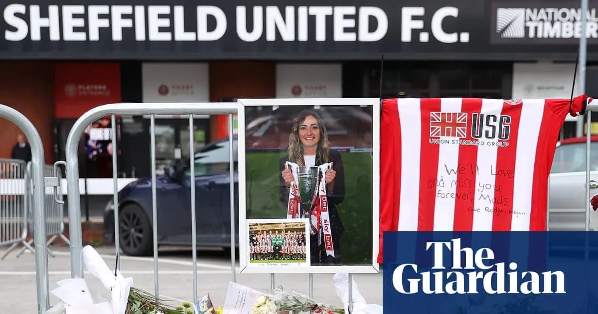 Tribute with flowers and photo outside Sheffield United F.C.