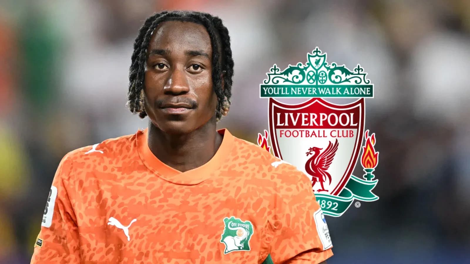 Joueur en maillot orange avec logo de Liverpool