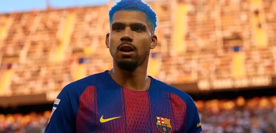 Joueur du FC Barcelone avec cheveux bleus sur le terrain