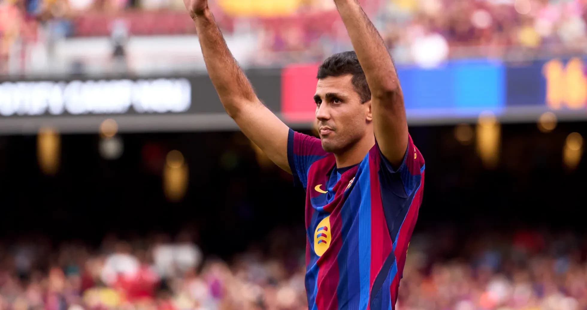 Joueur levant les bras au Camp Nou