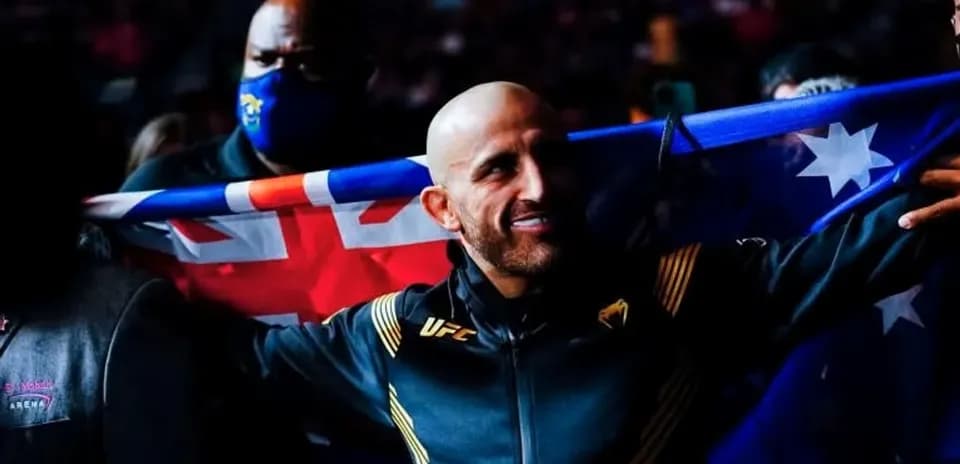 Fighter holding Australian flag before entering the octagon
