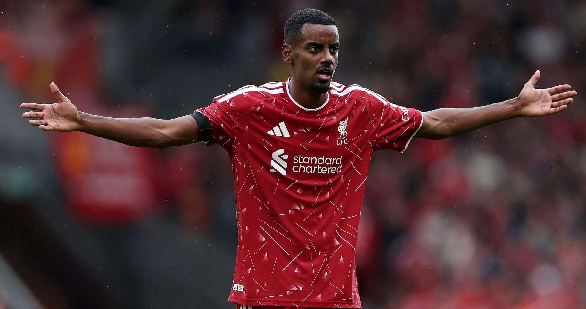 Joueur de Liverpool gesticulant sur le terrain