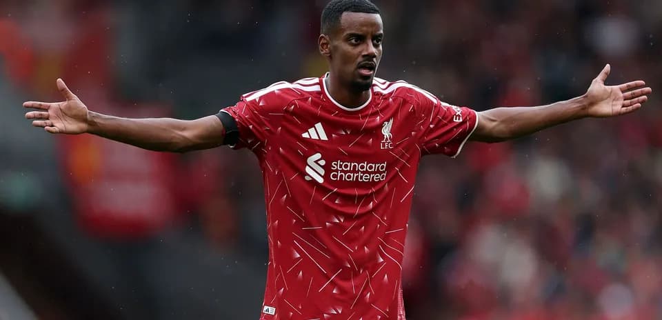 Joueur de Liverpool gesticulant sur le terrain