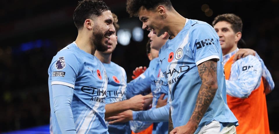 Joueurs de Manchester City célébrant un but