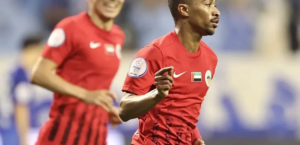 Joueur célébrant un but lors du match