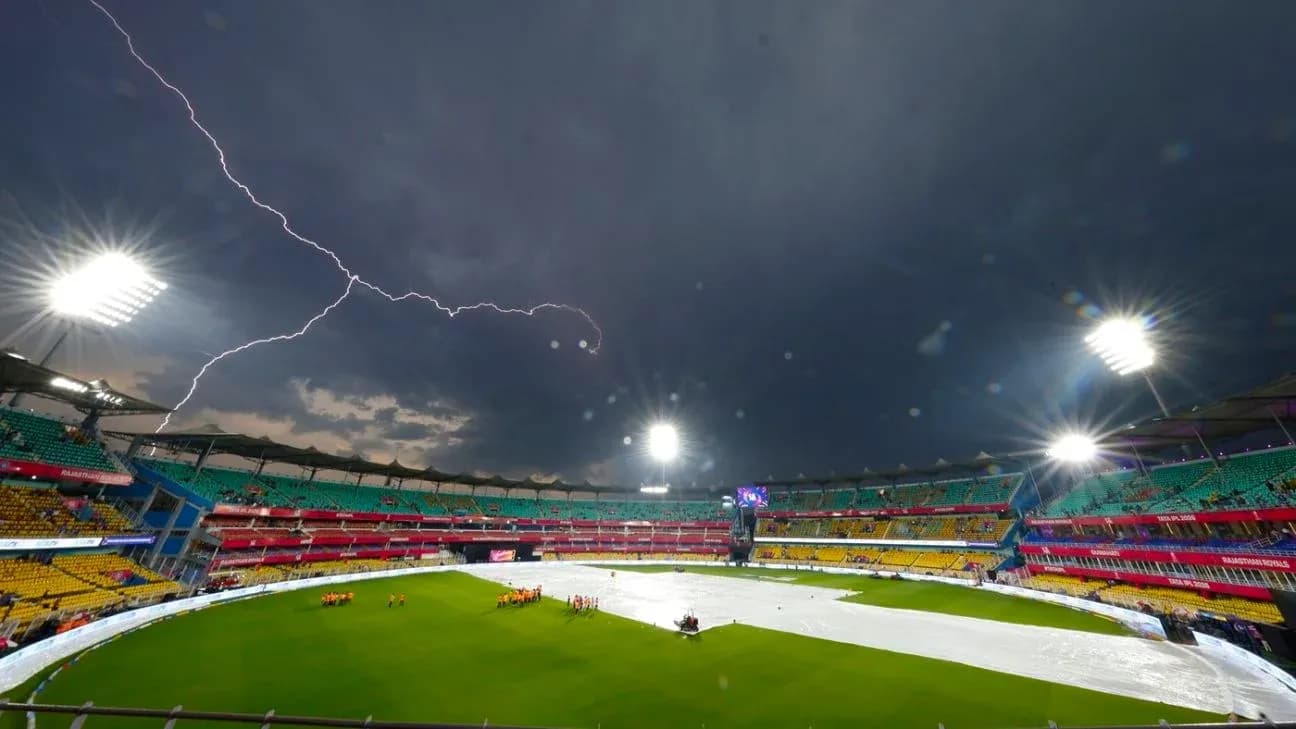 Stadium covered with tarpaulin under stormy sky
