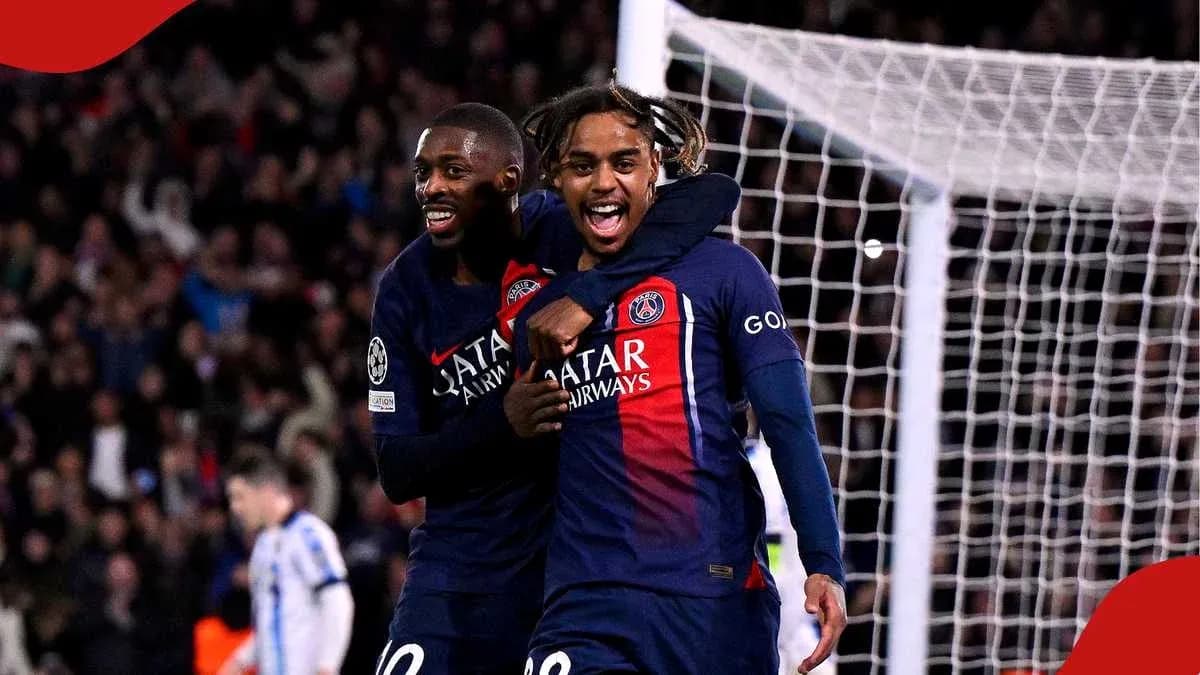 Joueurs du PSG célébrant un but ensemble