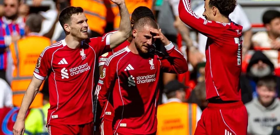 Joueurs de Liverpool célébrant un but