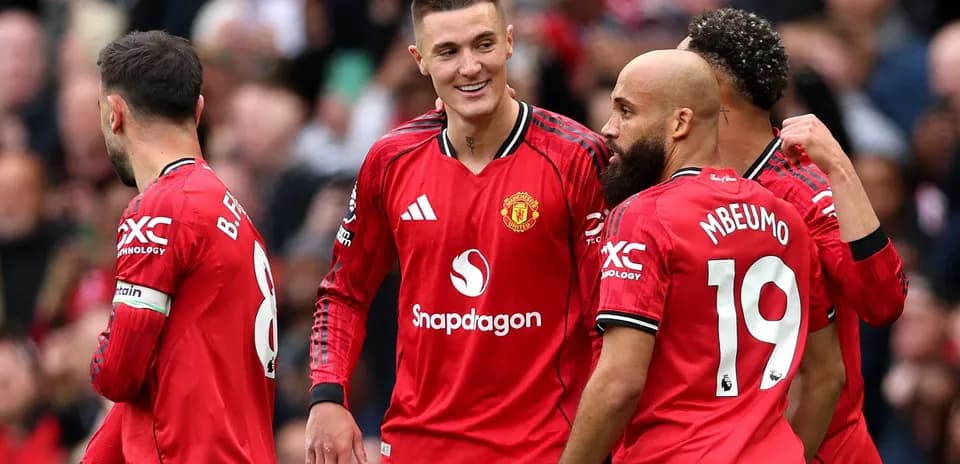 Joueurs de Manchester United célébrant un but