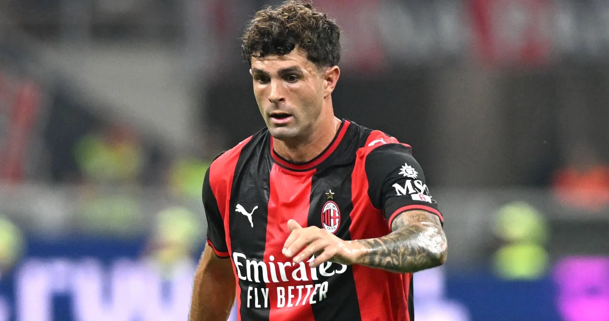 Joueur de l'AC Milan en action sur le terrain