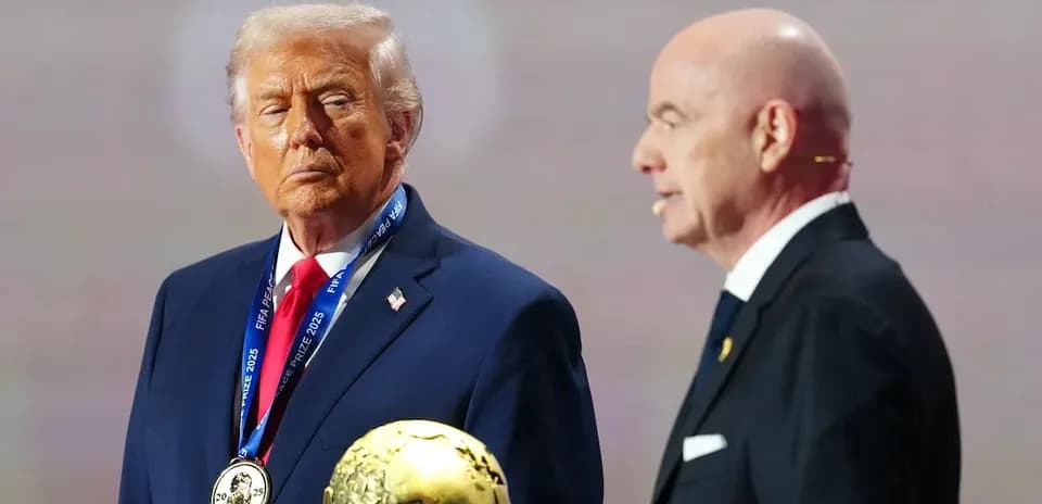 Donald Trump receiving FIFA award on stage