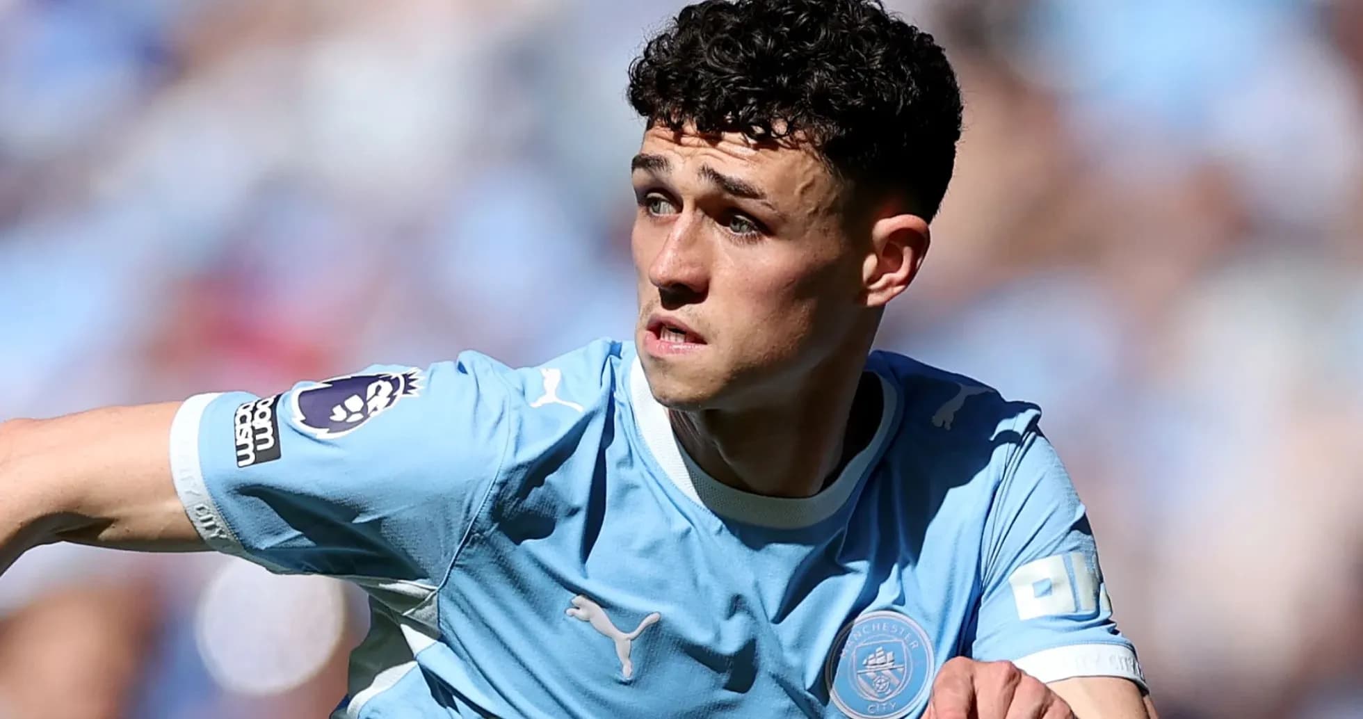 Joueur de Manchester City en action sur le terrain