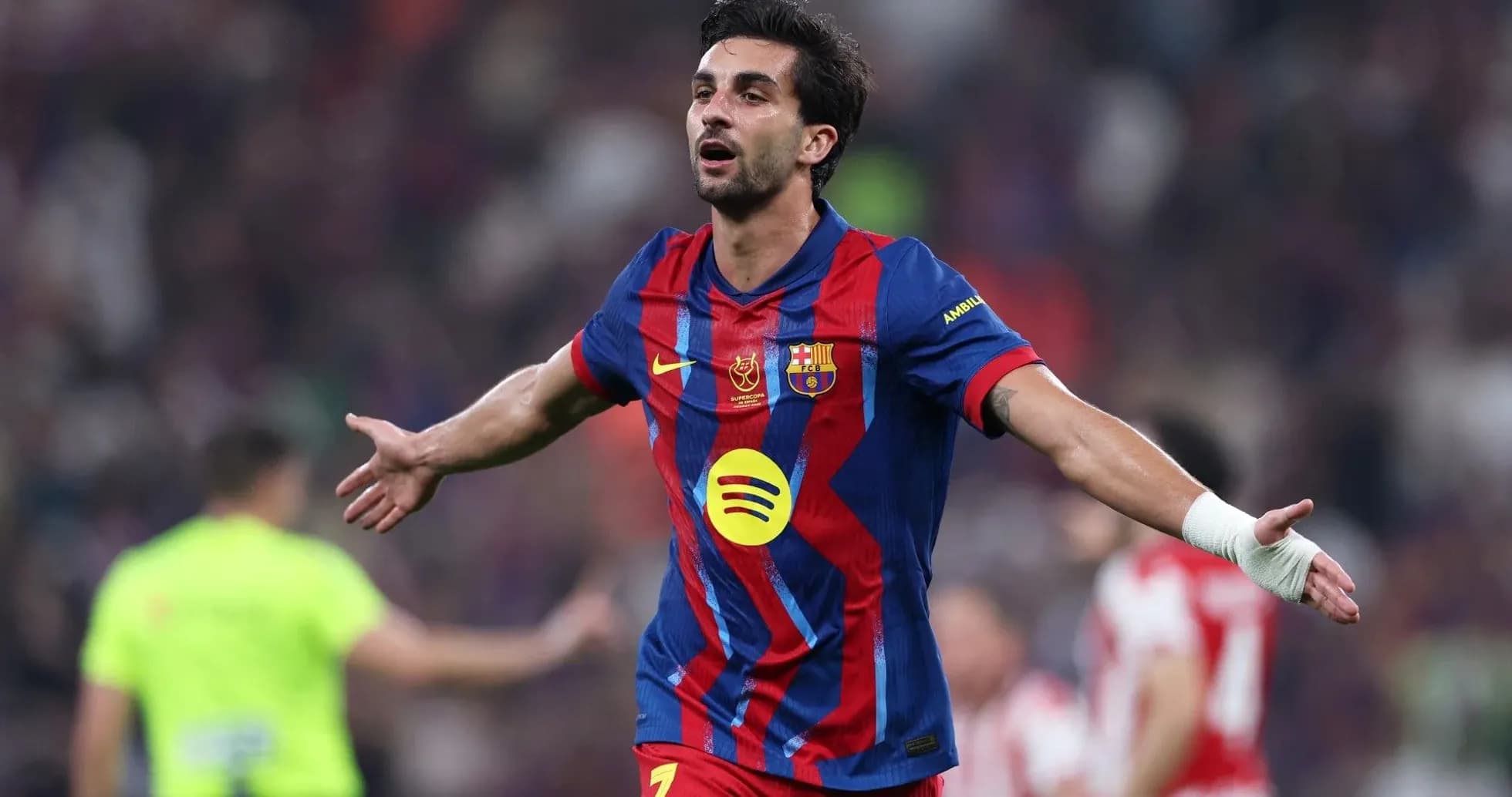 Joueur de Barcelone célébrant un but lors d'un match