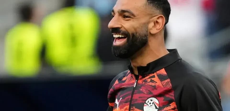 Joueur souriant lors d'un échauffement avant le match