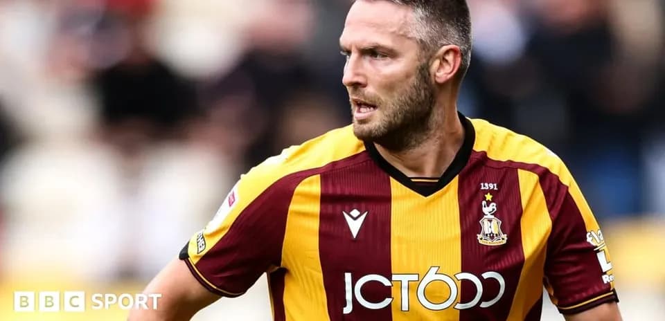 Joueur de Bradford City en action sur le terrain