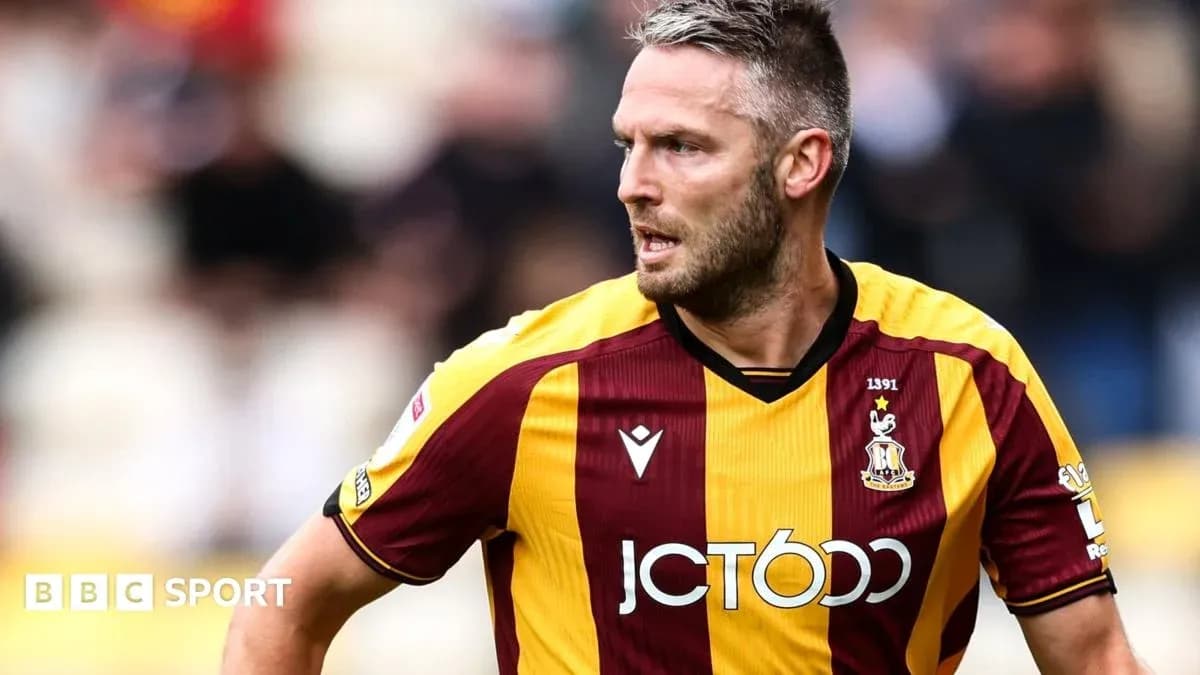 Joueur de Bradford City en action sur le terrain