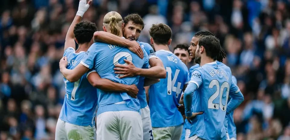 Joueurs de Manchester City célébrant un but