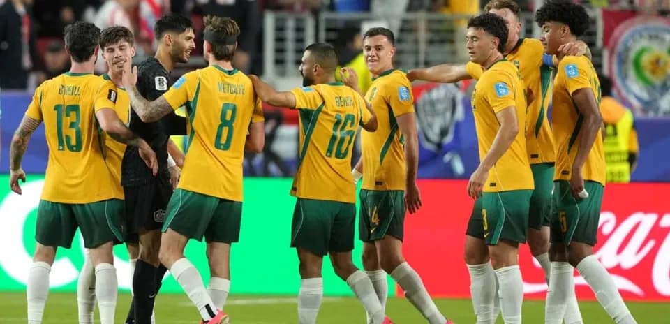 Joueurs australiens célébrant un but