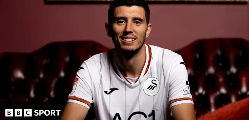 Joueur de Swansea City en maillot souriant