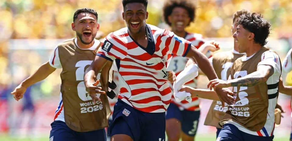 Joueurs américains célébrant un but lors du match