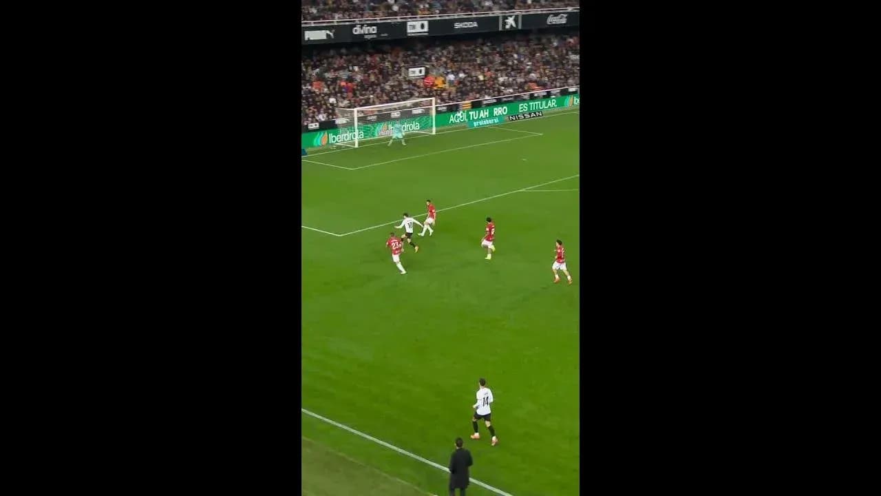 Joueurs de Mallorca et Valencia en action