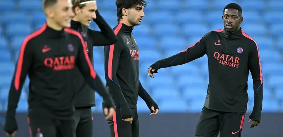 Joueurs du PSG s'échauffant avant le match